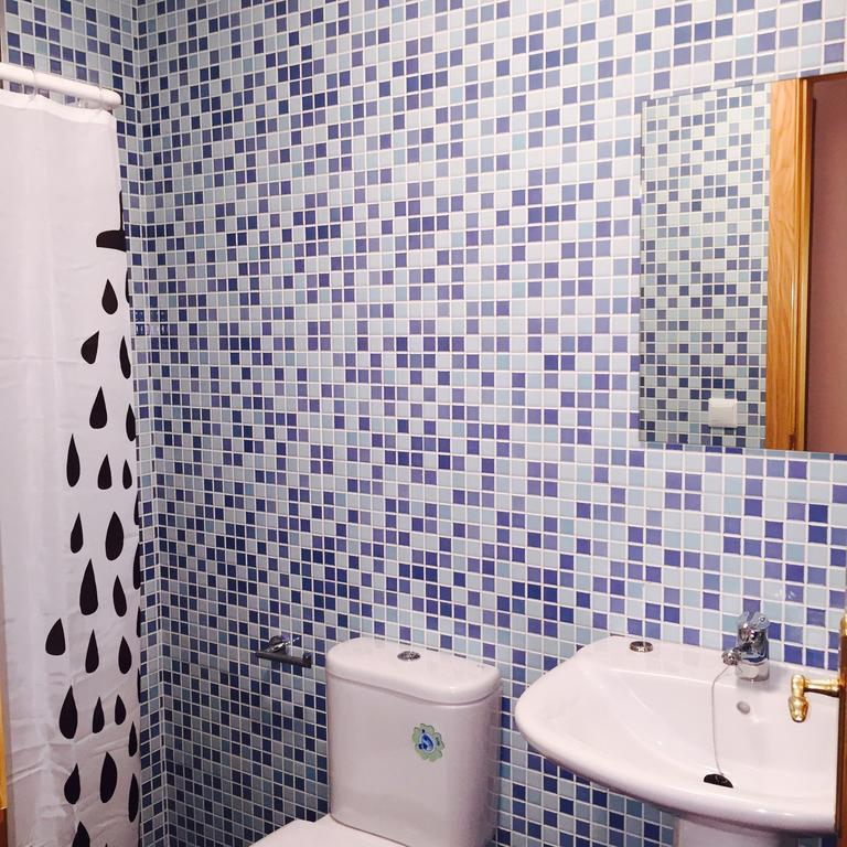 Apartamentos El Caxigu Аренас-де-Кабралес Номер фото