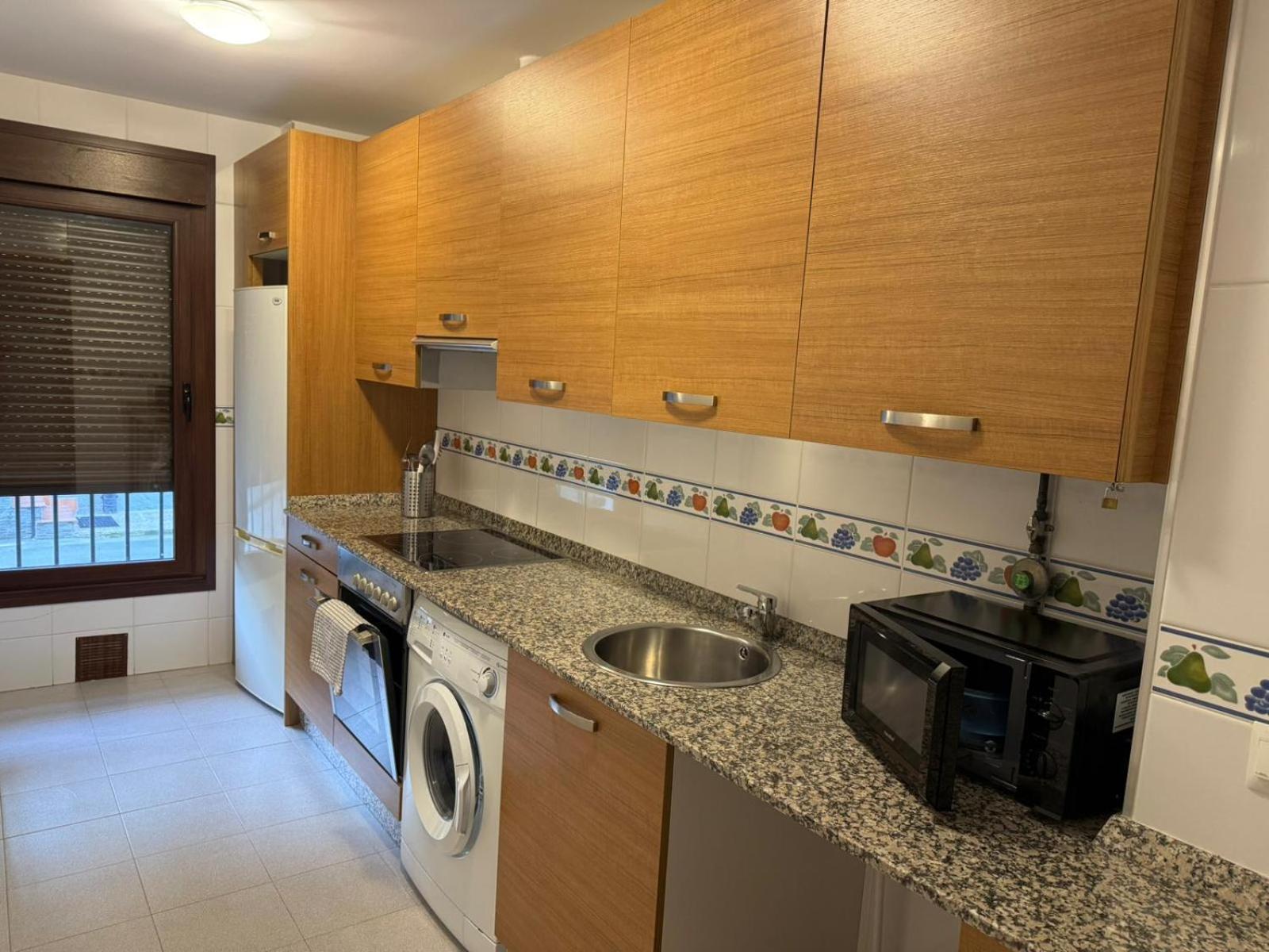 Apartamentos El Caxigu Аренас-де-Кабралес Экстерьер фото